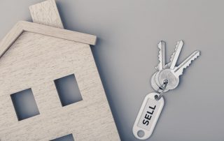 Home for sale with house keys